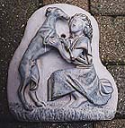 A wall plaque with whippet and figure